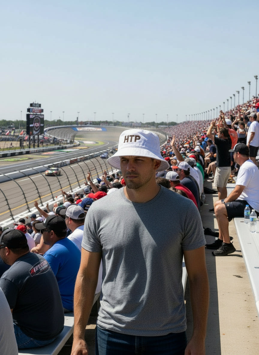 White bucket hat with 'HTP' text on a light gray background